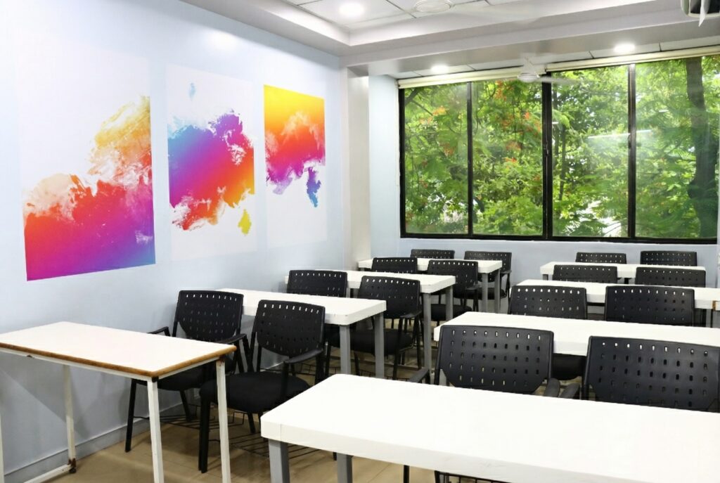 Fully equipped training room on rent in Pune with projector, whiteboard, WiFi, AC, and classroom-style seating at Tspaces